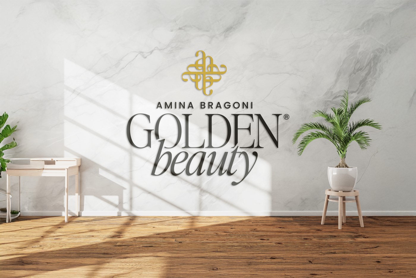Il marchio Golden Beauty sulla parete in marmo del centro estetico